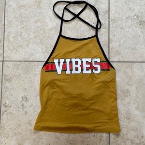 Halter tank. Tie around neck. Great condition.